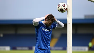 Bangor FC dominates Llanuwchllyn 5-0 at Bangor City Stadium, with five headed goals
