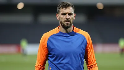 Bangor FC signs experienced goalkeeper John Danby to target a third promotion from the Cymru North